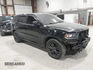 2015 Dodge Durango R/T with VIN 1C4SDJCT1FC690552, listed as a IAAI auction lot 41704294 with 136,555 mi miles and . Bid and sale history available at carsss.com. Image 1.