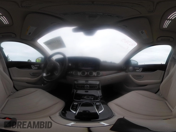 2018 Mercedes-Benz E 300 with VIN WDDZF4KB3JA385504, listed as a IAAI auction lot 42340289 with 15,336 mi miles and . Bid and sale history available at DreamBid. Image 19.