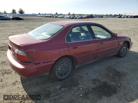 1996 Honda Accord LX with VIN 1HGCD563XTA266206, listed as a Copart auction lot 48601005 with 302,329 mi miles and Salvage Title. Bid and sale history available at DreamBid. Image 3.