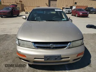 1997 Nissan Maxima GXE z VIN JN1CA21DXVT877062, wystawiony jako Copart lot #49411185 z przebiegiem 249 941 mil mil oraz Szkoda całkowita • Salvage title. Historia ofert i sprzedaży dostępna na DreamBid. Obrazek 5.