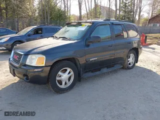 2005 GMC Envoy SLE with VIN 1GKDT13S852116252, listed as a IAAI auction lot 42086929 with 1 mi miles. Bid and sale history available at carsss.com. Image 2.