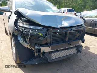 2024 Chevrolet Equinox LT with VIN 3GNAXKEG5RL334386, listed as a IAAI auction lot 42222344 with 11,826 mi miles and . Bid and sale history available at DreamBid. Image 6.