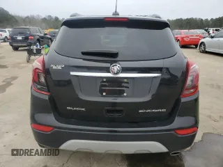 2017 Buick Encore Essence with VIN KL4CJCSBXHB099706, listed as a Copart auction lot 89332975 with 98,045 mi miles and Salvage Title. Bid and sale history available at DreamBid. Image 6.