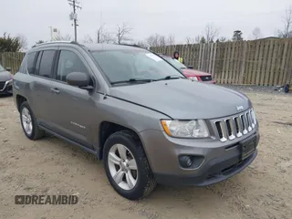 2011 Jeep Compass with VIN 1J4NT1FA2BD241485, listed as a IAAI auction lot 41496076 with 134,825 mi miles. Bid and sale history available at carsss.com. Image 1.