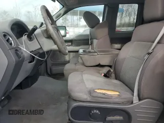 2004 Ford F-150 STX with VIN 1FTRX12W04NB26894, listed as a Copart auction lot 42958345 with 986,965 mi miles and Salvage Title. Bid and sale history available at carsss.com. Image 7.