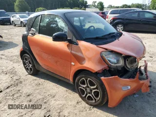 2016 Smart fortwo Passion с VIN WMEFJ5DA7GK066701, выставлен на аукционе Copart как лот 59093055 с пробегом 84 417 миль миль и Списание • Salvage title. История ставок и продаж доступна на DreamBid. Изображение 4.