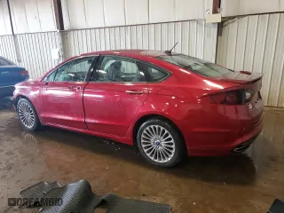 2014 Ford Fusion Titanium with VIN 3FA6P0K97ER101776, listed as a Copart auction lot 51811105 with 128,118 mi miles and Salvage Title. Bid and sale history available at carsss.com. Image 2.