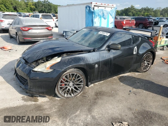 2012 Nissan 370Z Touring with VIN JN1AZ4EH5CM561035, listed as a Copart auction lot 67885714 with 121,109 mi miles and Non Repairable. Bid and sale history available at carsss.com. Image 1.