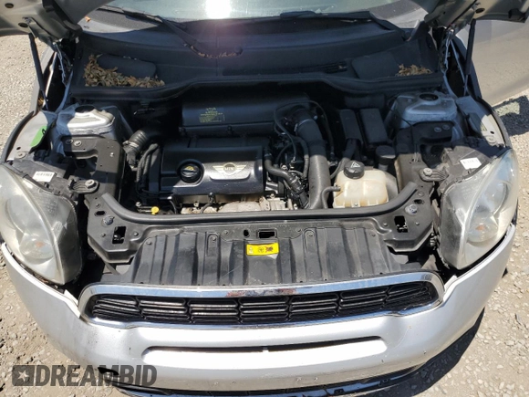 2013 MINI Countryman S with VIN WMWZC3C58DWP20864, listed as a Copart auction lot 64034385 with 72,487 mi miles and Clean title. Bid and sale history available at DreamBid. Image 11.