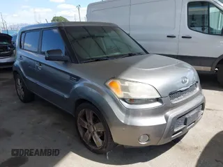 2011 Kia Soul + with VIN KNDJT2A21B7287057, listed as a IAAI auction lot 41913050 with 228,002 mi miles. Bid and sale history available at carsss.com. Image 1.