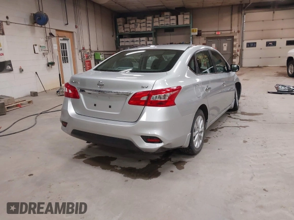 2019 Nissan Sentra S z VIN 3N1AB7AP7KY440764, wystawiony jako IAAI lot #41996693 z przebiegiem 34 594 mil mil oraz . Historia ofert i sprzedaży dostępna na DreamBid. Obrazek 4.