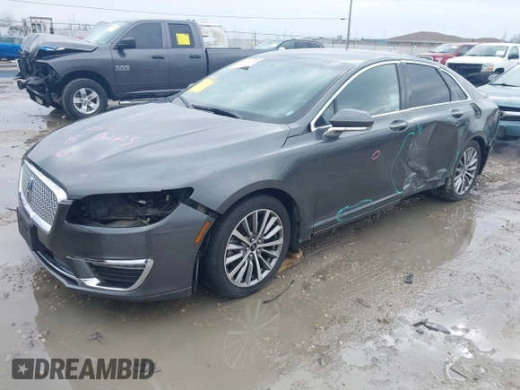 2017 Lincoln MKZ Hybrid Premiere with VIN 3LN6L5KU6HR609891, listed as a IAAI auction lot 41712359 with 112,349 mi miles. Bid and sale history available at carsss.com. Image 2.