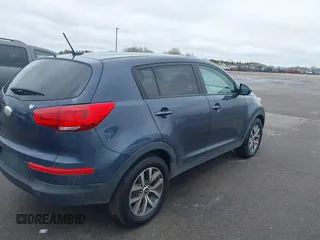 2014 Kia Sportage LX with VIN KNDPBCAC4E7585800, listed as a IAAI auction lot 42126740 with 193,573 mi miles and . Bid and sale history available at carsss.com. Image 4.