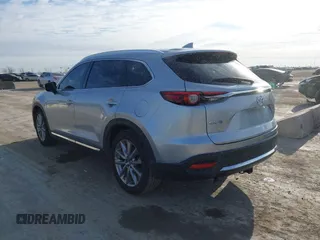 2020 Mazda CX-9 Grand Touring z VIN JM3TCADY7L0416696, wystawiony jako IAAI lot #41310183 z przebiegiem 105 754 mil mil oraz . Historia ofert i sprzedaży dostępna na DreamBid. Obrazek 3.