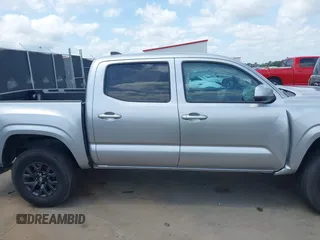 2023 Toyota Tacoma SR with VIN 3TYCZ5AN4PT149730, listed as a IAAI auction lot 42083146 with 31,731 mi miles and . Bid and sale history available at DreamBid. Image 13.