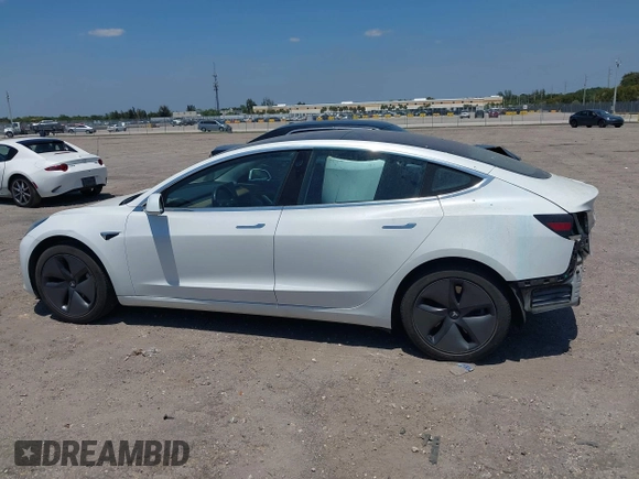 2018 Tesla Model 3 Long Range Battery with VIN 5YJ3E1EAXJF027179, listed as a IAAI auction lot 42059918 with 43,566 mi miles. Bid and sale history available at carsss.com. Image 15.