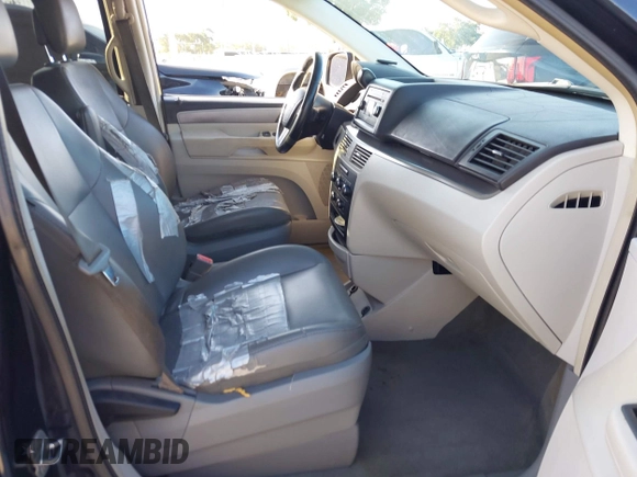 2011 Volkswagen Routan SE with VIN 2V4RW3DG5BR668194, listed as a IAAI auction lot 42483379 with 203,945 mi miles and . Bid and sale history available at DreamBid. Image 5.
