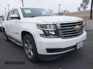 2016 Chevrolet Suburban LT z VIN 1GNSCHKC4GR287944, wystawiony jako IAAI lot #42163383 z przebiegiem 87 791 mil mil oraz . Historia ofert i sprzedaży dostępna na DreamBid. Obrazek 1.