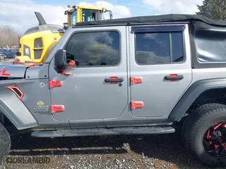2018 Jeep Wrangler Unlimited Sport S with VIN 1C4HJXDG0JW250952, listed as a IAAI auction lot 41641476 with 117,284 mi miles. Bid and sale history available at carsss.com. Image 14.