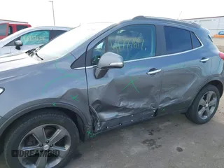 2014 Buick Encore with VIN KL4CJASB0EB727448, listed as a IAAI auction lot 41777697 with 128,812 mi miles. Bid and sale history available at carsss.com. Image 6.