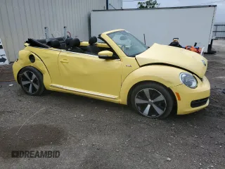 2013 Volkswagen Beetle 2.5L with VIN 3VW5P7AT6DM812504, listed as a Copart auction lot 52156165 with 53,682 mi miles and Salvage Title. Bid and sale history available at DreamBid. Image 4.