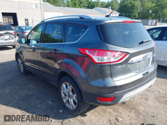 2016 Ford Escape Titanium with VIN 1FMCU9J99GUB27573, listed as a IAAI auction lot 42445457 with 156,784 mi miles and . Bid and sale history available at DreamBid. Image 3.