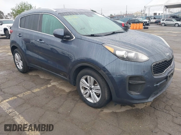 2018 Kia Sportage LX with VIN KNDPM3ACXJ7413596, listed as a IAAI auction lot 41871847 with 72,959 mi miles and . Bid and sale history available at carsss.com. Image 1.