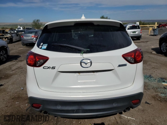 2016 Mazda CX-5 Grand Touring with VIN JM3KE2DY0G0888854, listed as a Copart auction lot 68379754 with 73,096 mi miles and Salvage Title. Bid and sale history available at carsss.com. Image 6.