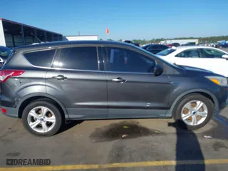 2015 Ford Escape SE with VIN 1FMCU0G75FUC20011, listed as a IAAI auction lot 41979578 with 182,414 mi miles. Bid and sale history available at carsss.com. Image 13.
