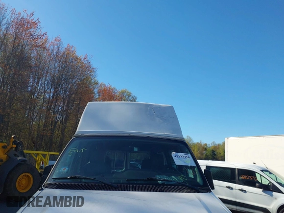 2012 Ford Econoline Cargo Recreational with VIN 1FTNE2EW0CDA38549, listed as a IAAI auction lot 42133456 with 95,252 mi miles and . Bid and sale history available at DreamBid. Image 6.