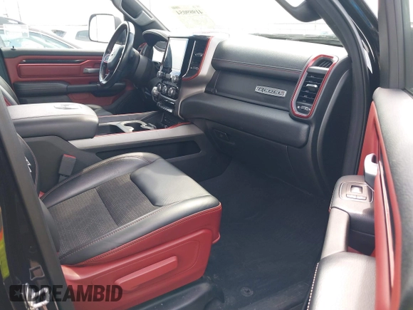2019 Ram 1500 Rebel with VIN 1C6SRFLT2KN592652, listed as a IAAI auction lot 41989054 with 71,630 mi miles and . Bid and sale history available at DreamBid. Image 5.