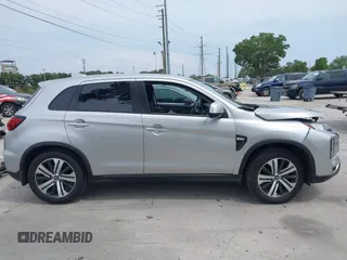 2023 Mitsubishi Outlander ES z VIN JA4ARUAU9PU007786, wystawiony jako IAAI lot #42343050 z przebiegiem 27 507 mil mil oraz . Historia ofert i sprzedaży dostępna na DreamBid. Obrazek 14.