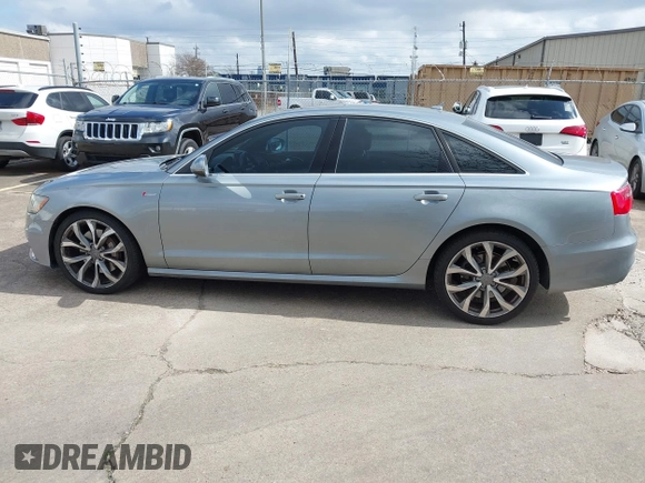 2013 Audi A6 3.0T Prestige with VIN WAUHGAFC4DN126258, listed as a IAAI auction lot 41512291 with 123,298 mi miles. Bid and sale history available at carsss.com. Image 15.