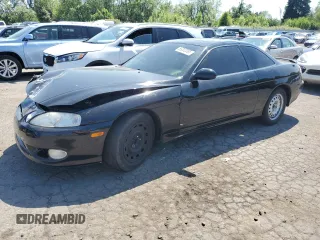 1997 Lexus SC 400 with VIN JT8CH32Y6V0052491, listed as a Copart auction lot 59202095 with 160,656 mi miles and Salvage title. Bid and sale history available at DreamBid. Image 1.