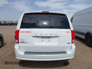 2017 Dodge Grand Caravan SE z VIN 2C4RDGBG4HR666987, wystawiony jako IAAI lot #41946734 z przebiegiem 239 683 mil mil oraz . Historia ofert i sprzedaży dostępna na DreamBid. Obrazek 16.