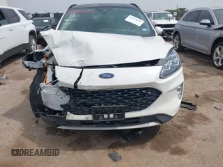 2020 Ford Escape Titanium Hybrid with VIN 1FMCU0DZ9LUA54867, listed as a IAAI auction lot 42268245 with 68,974 mi miles and . Bid and sale history available at DreamBid. Image 6.