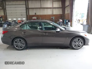 2014 Infiniti Q50 Sport with VIN JN1BV7AR5EM694526, listed as a IAAI auction lot 42782010 with 145,152 mi miles and . Bid and sale history available at DreamBid. Image 13.