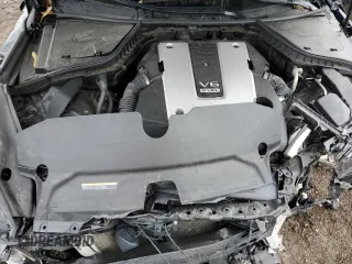 2015 Infiniti Q50 z VIN JN1BV7ARXFM399570, wystawiony jako Copart lot #57673905 z przebiegiem 126 841 mil mil oraz Szkoda całkowita • Salvage title. Historia ofert i sprzedaży dostępna na DreamBid. Obrazek 11.