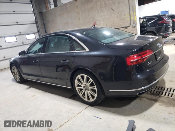2015 Audi A8 3.0T with VIN WAU3GAFD9FN023200, listed as a Copart auction lot 59856315 with 140,472 mi miles and Salvage title. Bid and sale history available at DreamBid. Image 2.