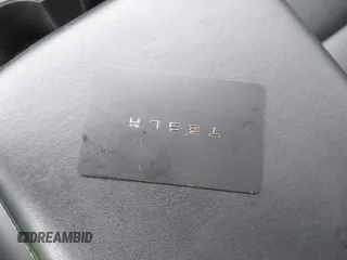 2019 Tesla Model 3 Mid Range with VIN 5YJ3E1EA3KF313425, listed as a IAAI auction lot 41806388 with 110,767 mi miles and . Bid and sale history available at carsss.com. Image 11.