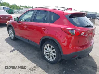 2014 Mazda CX-5 Grand Touring with VIN JM3KE2DY3E0382920, listed as a IAAI auction lot 42102876 with 324,608 mi miles. Bid and sale history available at carsss.com. Image 3.