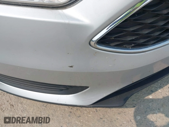 2015 Ford Focus SE с VIN 1FADP3F21FL203452, выставлен на аукционе IAAI как лот 40119573 с пробегом 143 915 миль миль и . История ставок и продаж доступна на DreamBid. Изображение 6.