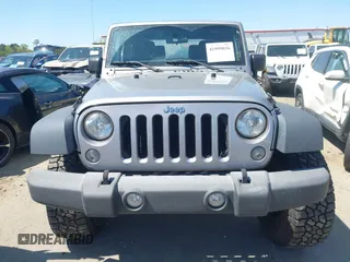 2015 Jeep Wrangler Sport with VIN 1C4AJWAG3FL696988, listed as a IAAI auction lot 41999036 with 79,064 mi miles. Bid and sale history available at carsss.com. Image 12.