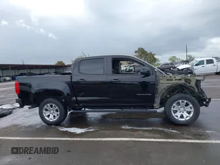 2021 Chevrolet Colorado 2WD LT with VIN 1GCGSCEN7M1239057, listed as a IAAI auction lot 41920091 with 44,066 mi miles and . Bid and sale history available at DreamBid. Image 14.