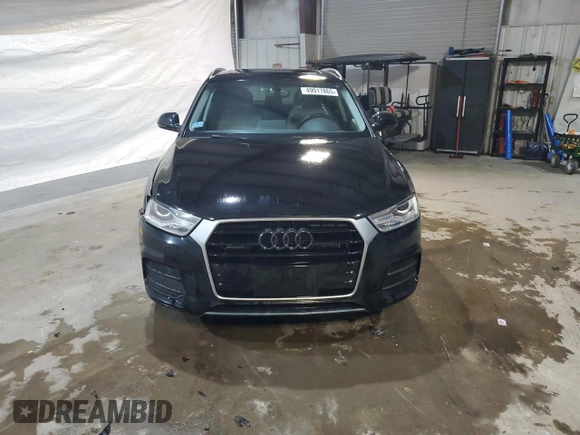 2017 Audi Q3 Premium z VIN WA1ECCFSXHR014335, wystawiony jako Copart lot #49917865 z przebiegiem 163 521 mil mil oraz Czysty tytuł • Clean title. Historia ofert i sprzedaży dostępna na DreamBid. Obrazek 5.