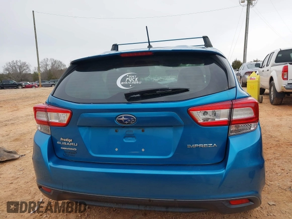 2019 Subaru Impreza with VIN 4S3GTAA64K3718084, listed as a IAAI auction lot 41726910 with 56,523 mi miles and . Bid and sale history available at DreamBid. Image 16.