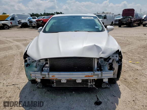 2014 Ford Fusion SE Hybrid with VIN 3FA6P0LU1ER110489, listed as a Copart auction lot 58364095 with 112,605 mi miles and Salvage title. Bid and sale history available at DreamBid. Image 5.