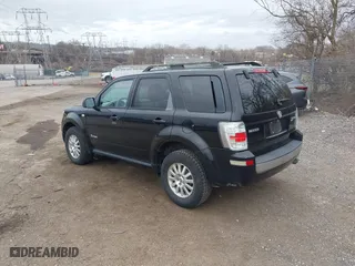 2009 Mercury Mariner Hybrid with VIN 4M2CU29359KJ09642, listed as a IAAI auction lot 41734762 with 233,989 mi miles. Bid and sale history available at carsss.com. Image 3.
