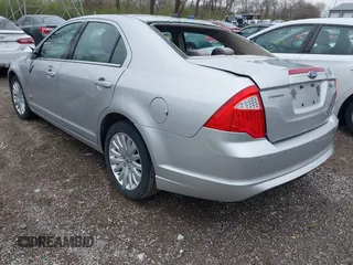 2010 Ford Fusion Hybrid with VIN 3FADP0L30AR121282, listed as a IAAI auction lot 41943397 with 109,559 mi miles. Bid and sale history available at carsss.com. Image 3.