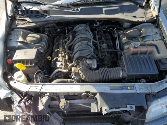 2006 Chrysler 300 C z VIN 2C3LA63H66H408557, wystawiony jako Copart lot #57797005 z przebiegiem 71 932 mil mil oraz Szkoda całkowita • Salvage title. Historia ofert i sprzedaży dostępna na DreamBid. Obrazek 11.